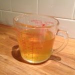 vinegar in measuring cup