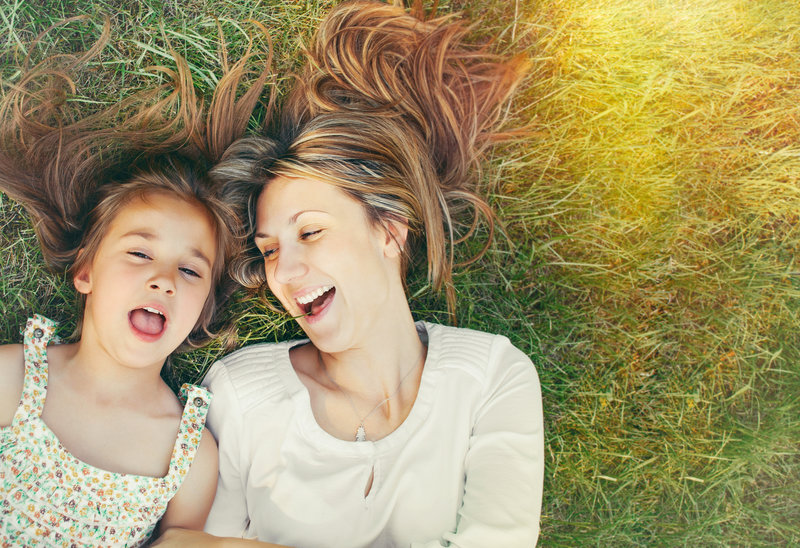 mother and daughter laughing together